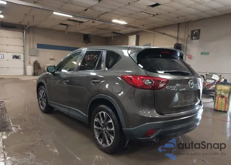 2016 Mazda Cx-5 Grand Touring z USA, uszkodzony, nr VIN JM3KE4DY4G0660321